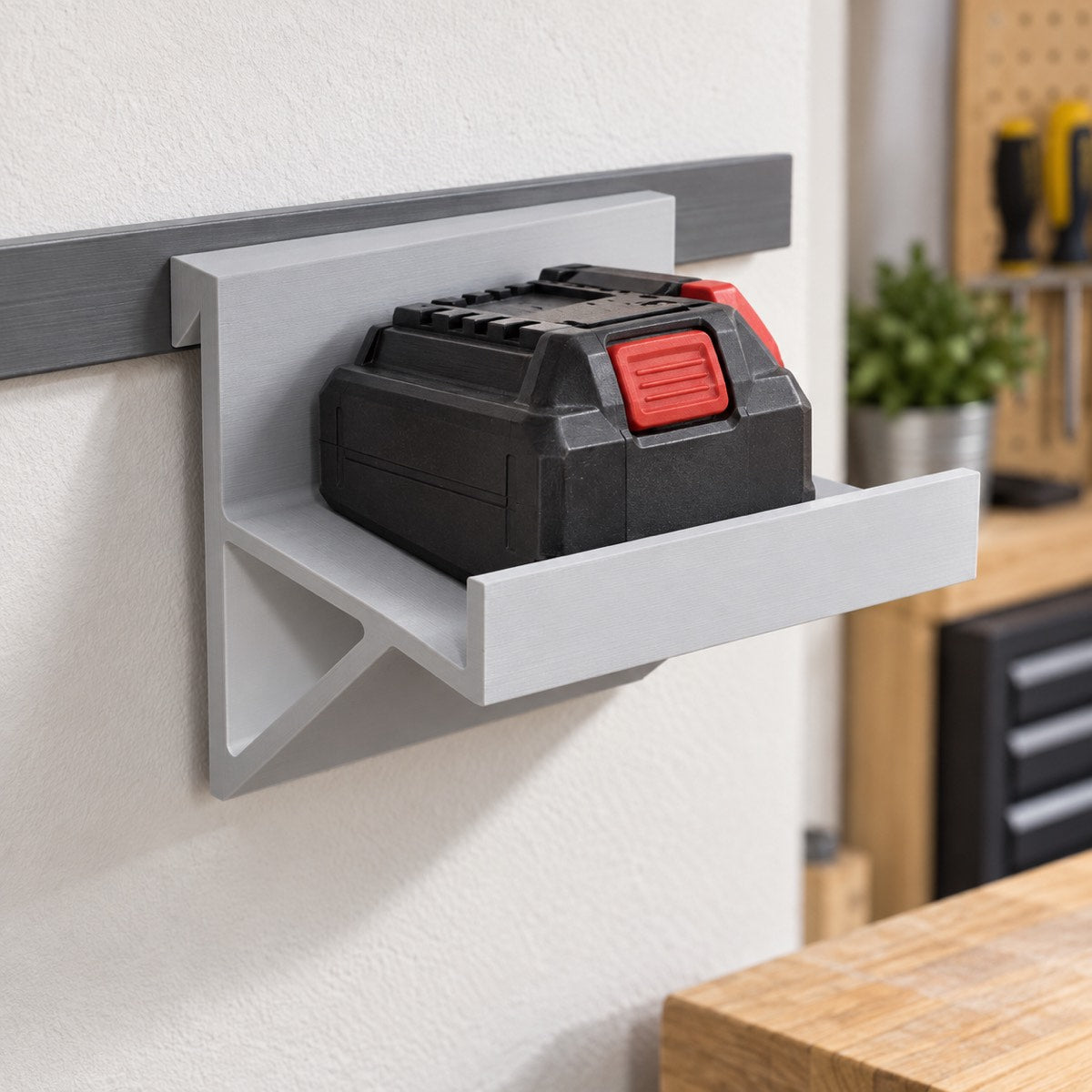 Batteriholder for veggskinne
